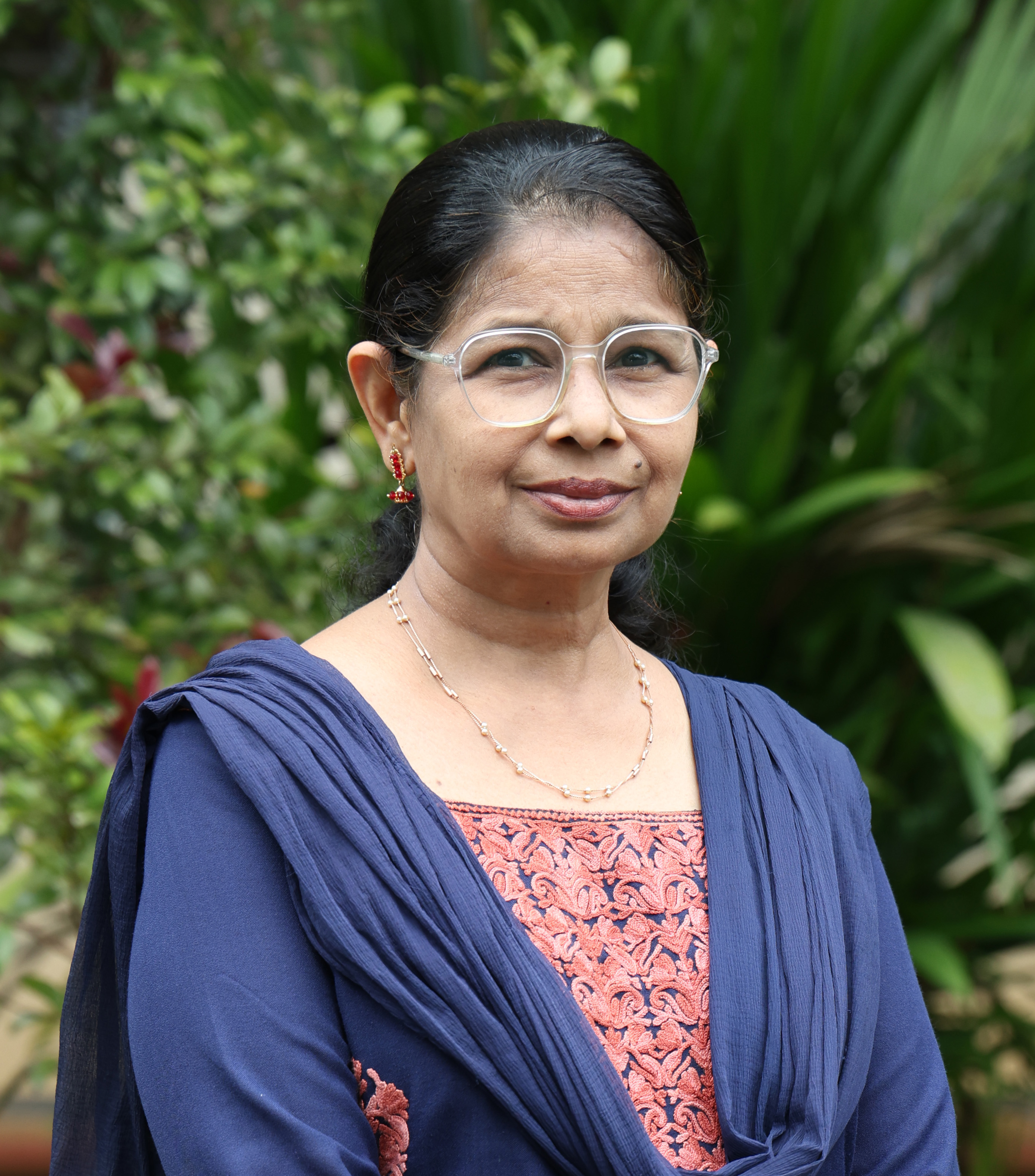 Ms. Radhika C